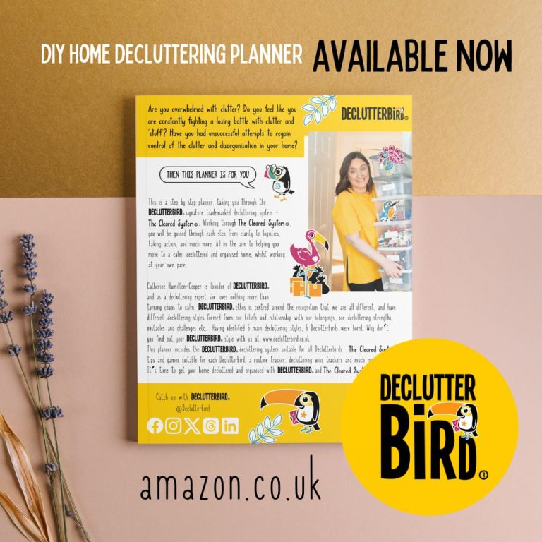 Back Cover of Declutterbird DIY Home Decluttering Planner Featuring The Cleared System